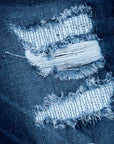 Pantalón de mezclilla stretch parches