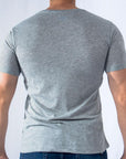 Imagen trasera de playera cuello redondo con logo classic color gris marca Bros Club