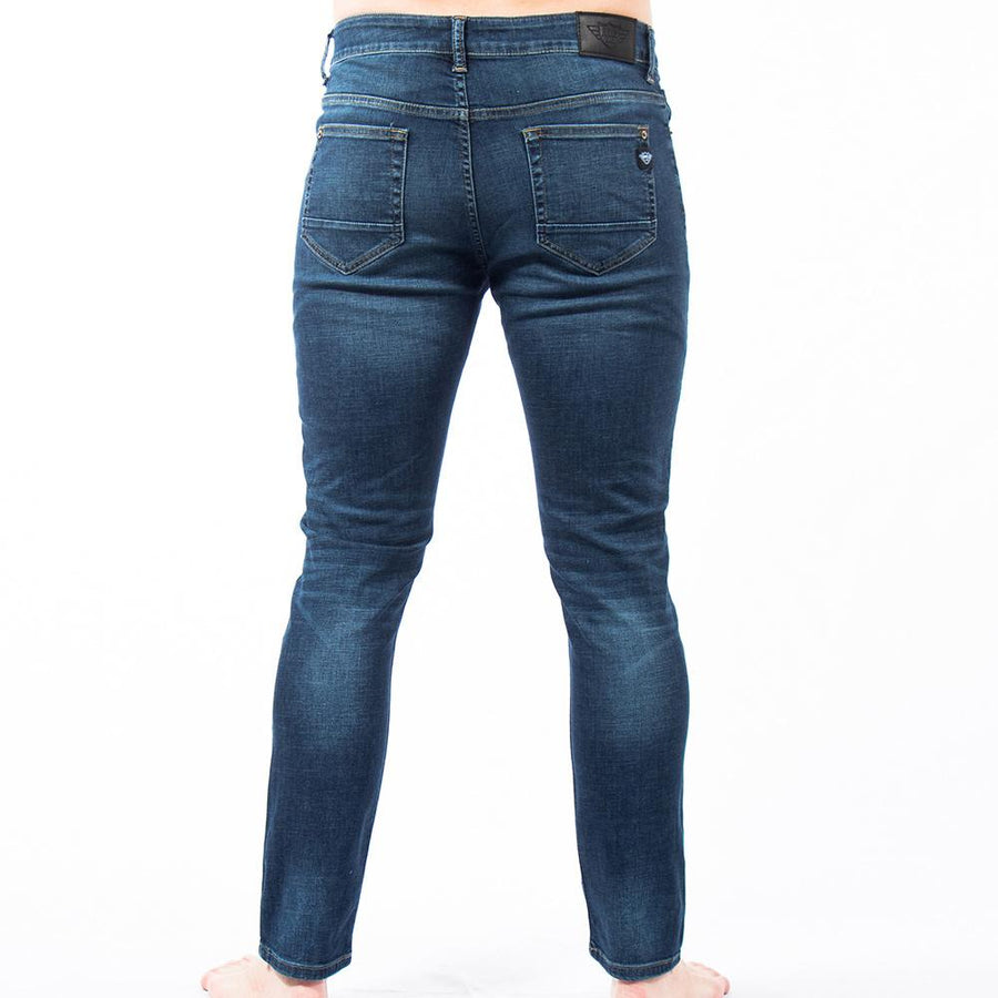 Imagen de espalda de jeans caballero deslavados marca Bros Club