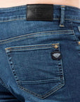 Imagen de etiquetas de jeans caballero deslavados marca Bros Club