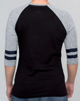 Imagen de espalda playera manga larga con estampado color negro con jaspe para mujer.
