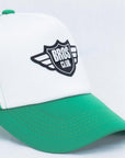 Imagen de acercamiento a gorra camionero color verde marca Bros Club